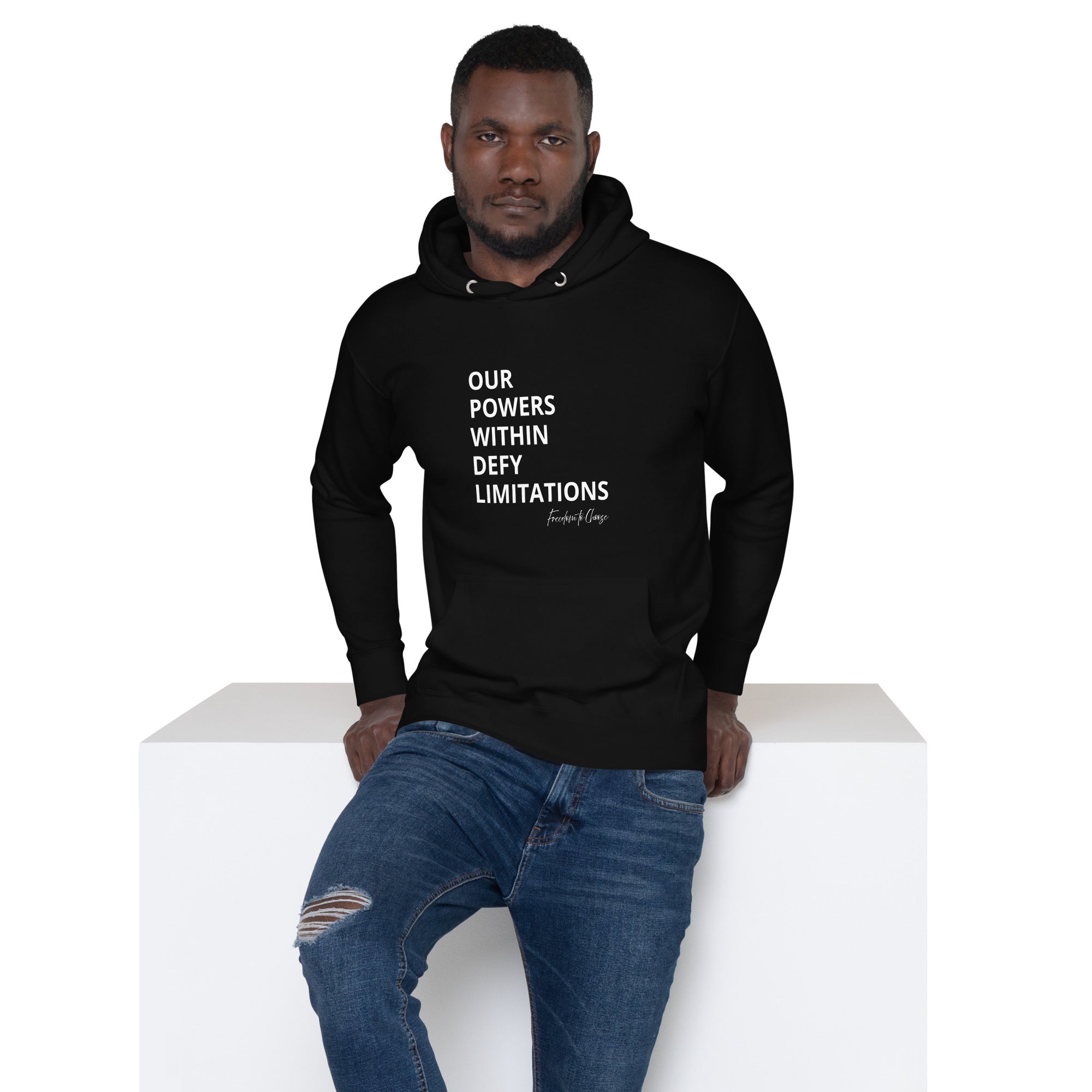 Unisex hoodie with centered white text reading “Our powers within defy limitations,” with “Freedom to Choose” in script at the bottom right.