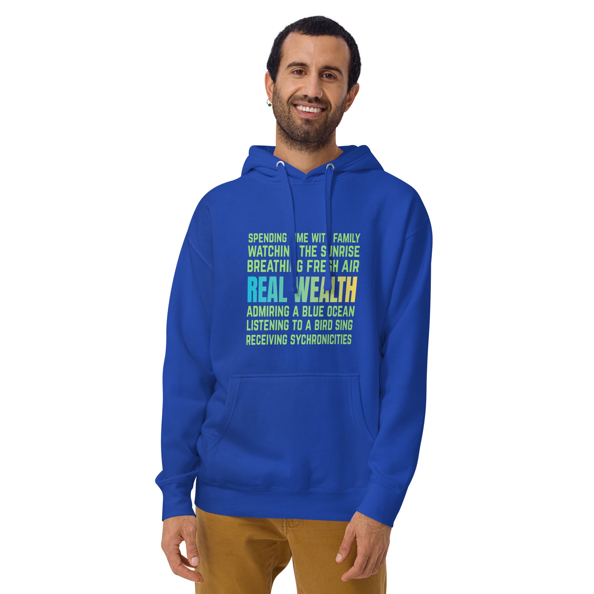 Unisex hoodie featuring the “Real Wealth” affirmation design with layered text about nature, breath, and synchronicity.