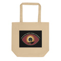 Eco tote bag featuring an eye symbol with the phrase ‘As we awaken together, change is unstoppable.’ 