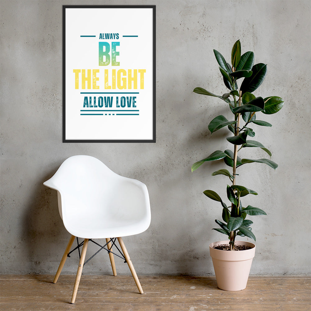 A black framed poster featuring the phrase “Always Be the Light — Allow Love,” displayed on a wall.
