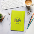 Lime journal featuring the “Level 369” logo on the front cover.