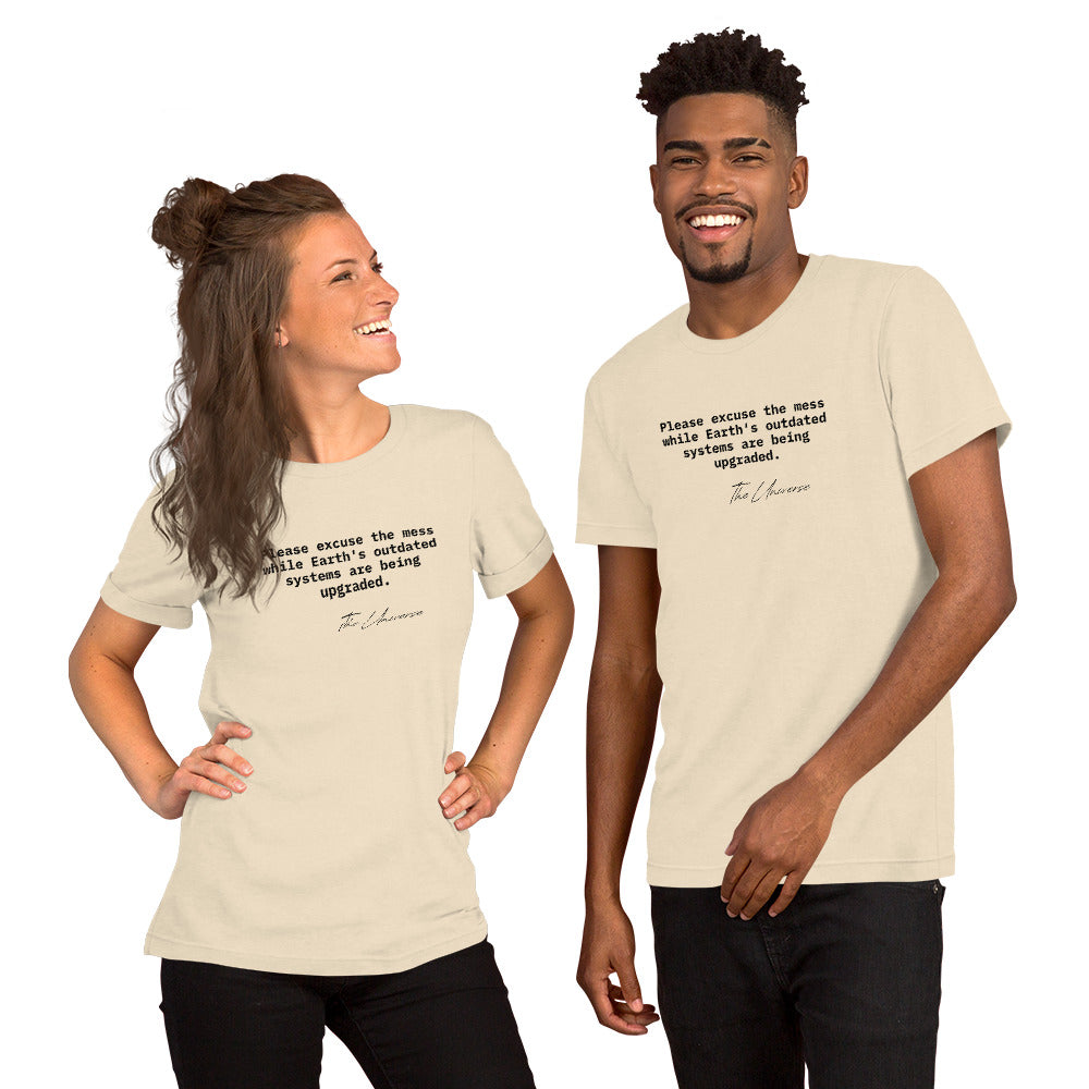 Natural heather unisex t-shirt featuring the phrase 'Please excuse the mess while Earth’s outdated systems are being upgraded.'