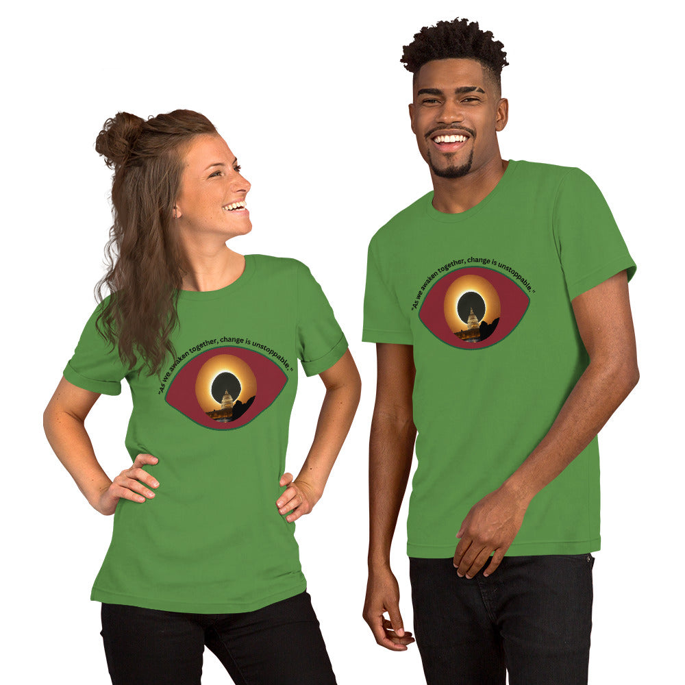Green unisex t-shirt featuring the phrase “As We Awaken Together."
