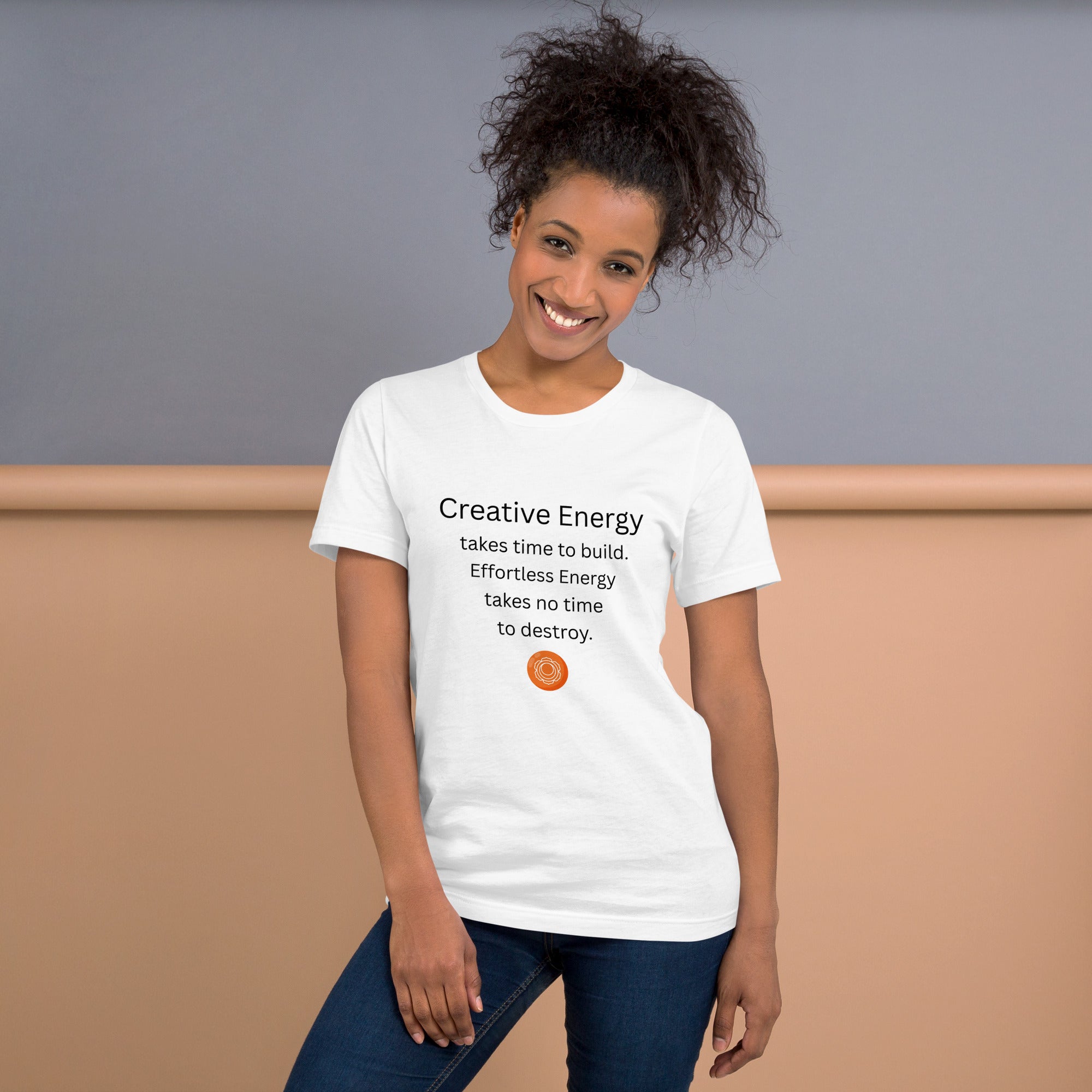 Unisex t-shirt featuring the phrase “Creative Energy takes time to build. Effortless Energy takes no time to destroy.” with a sacral chakra mandala symbol.