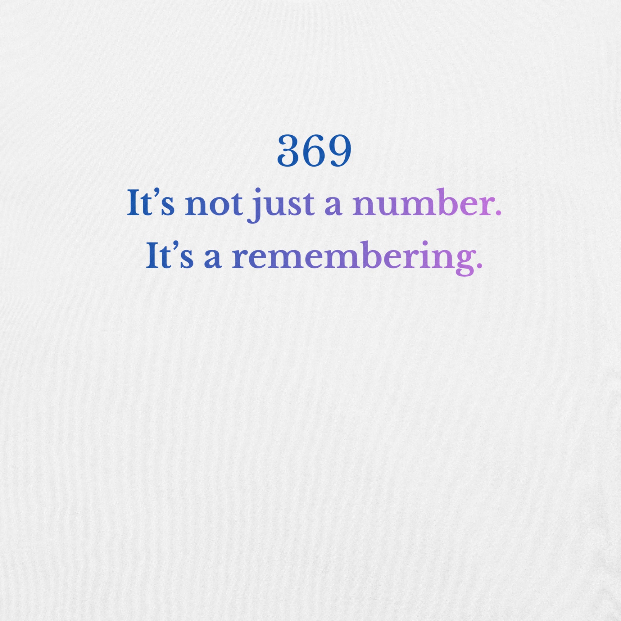 Close-up of the phrase “369 – It's not just a number. It’s a remembering.” printed in a soft blue-to-lavender gradient on a white background.