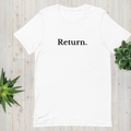 White “Return.” minimalist t-shirt displayed on a wooden surface with green plants for a calm, natural setting