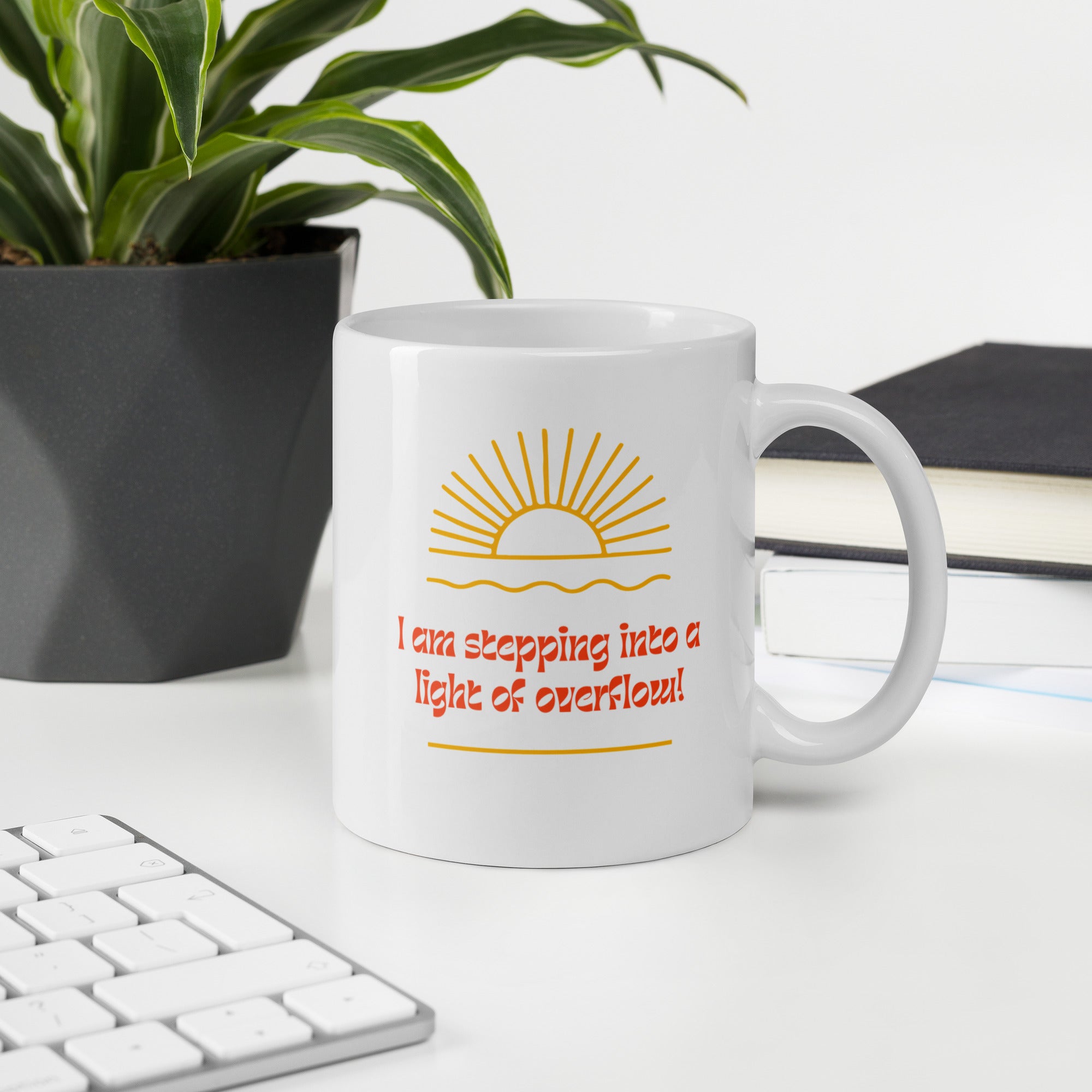 White ceramic mug featuring the phrase "I Am Stepping into a Light of Overflow."