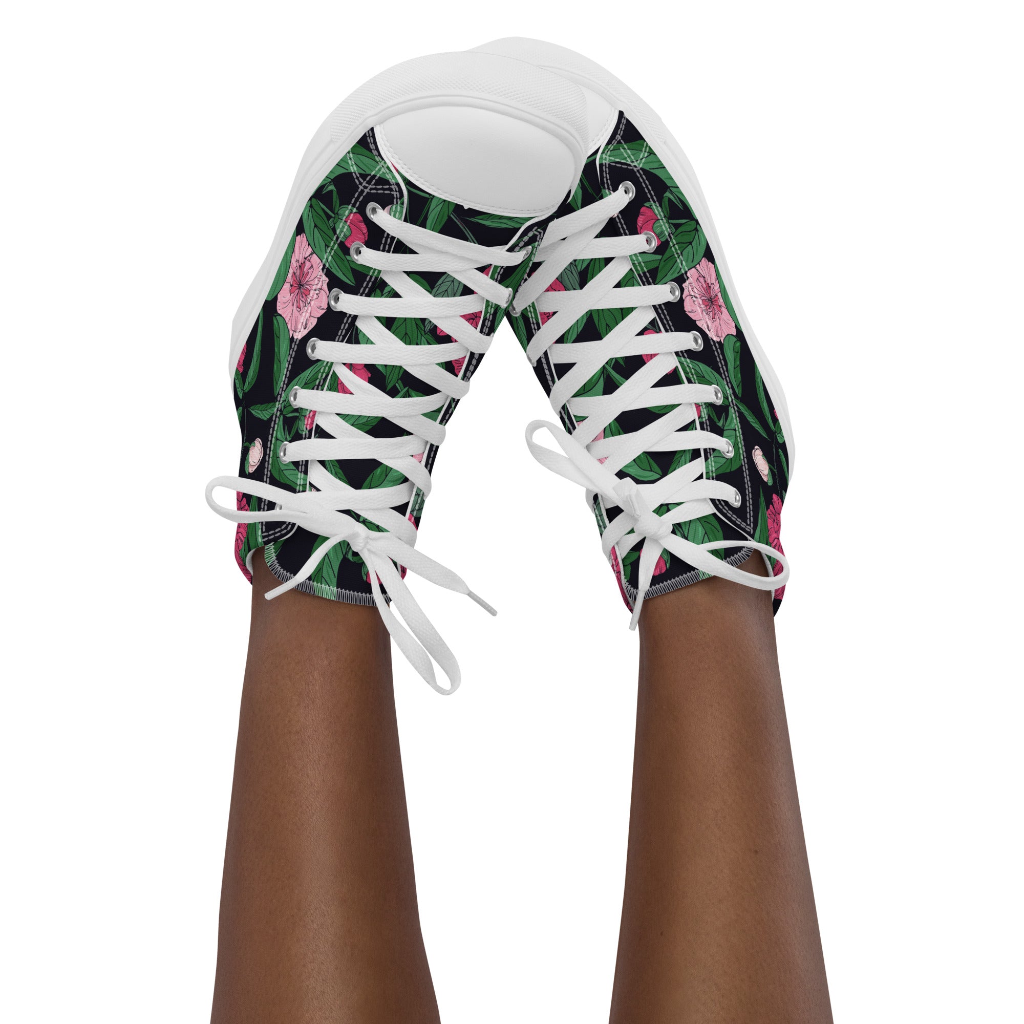 Black floral women’s high-top canvas shoes featuring bold botanical design.